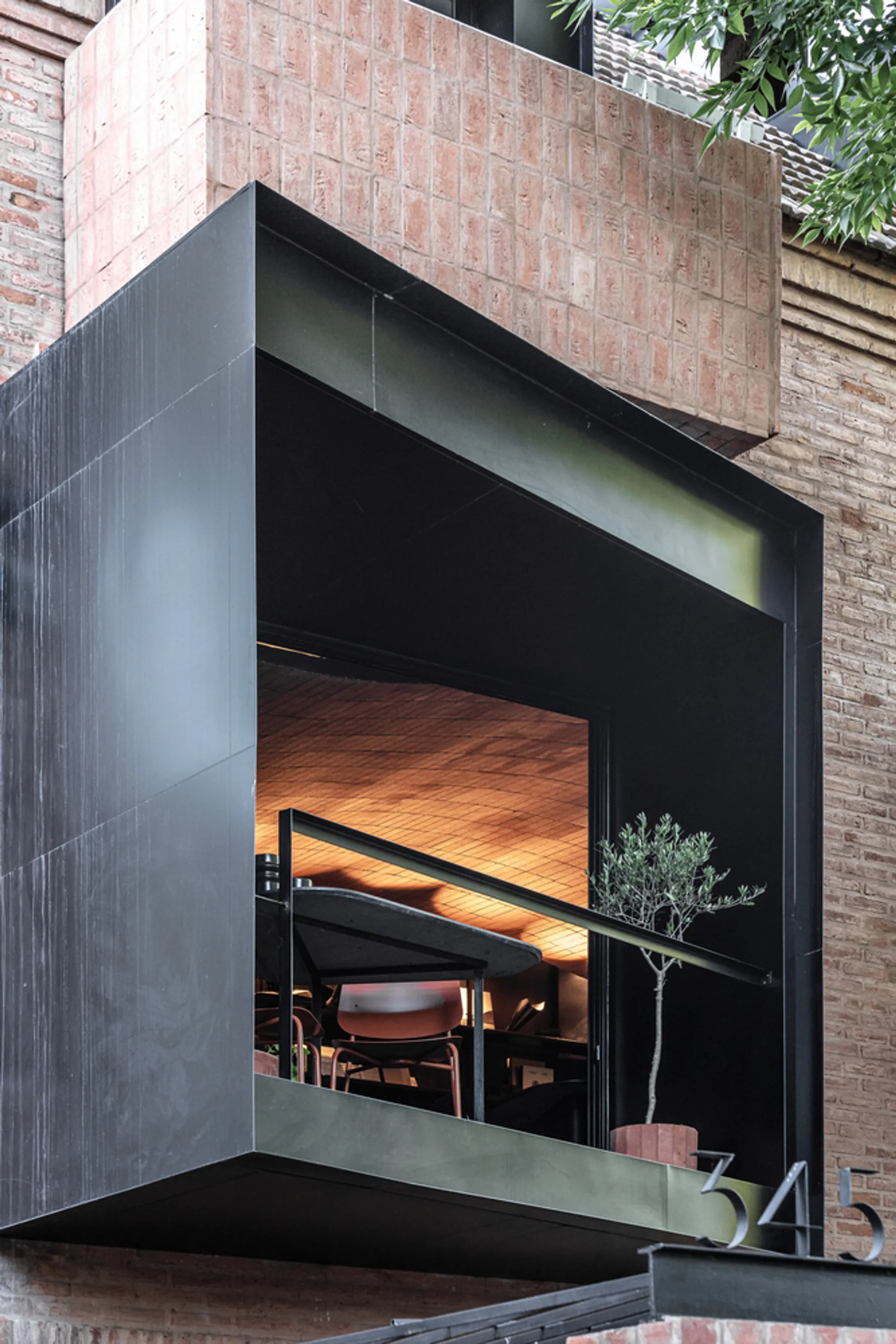 Grizzo Studio Folds a Dental Clinic, a Home, and a Grand Piano into One Buenos Aires Facade