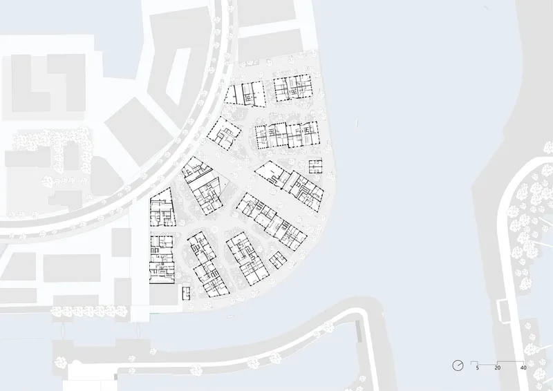 Floor plan drawing displaying angled building footprints with interior room divisions across the development site