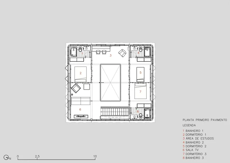 First floor plan drawing showing bedrooms arranged around central double-height void and stairwell