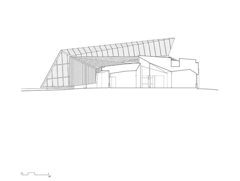 Elevation drawing showing a sloped roof structure with exposed trusses rising above rectilinear volumes