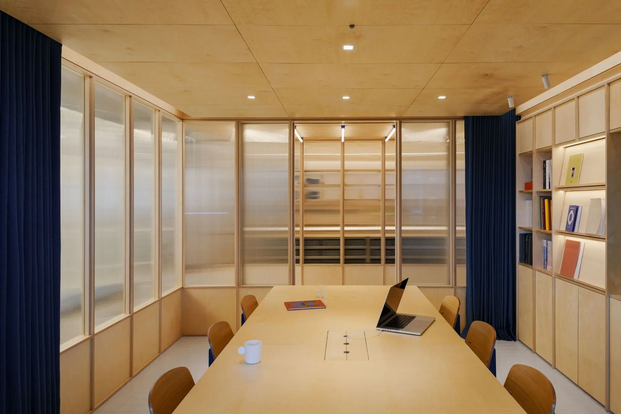 InOrder Studio Wraps a Taichung Office in Birch Plywood for a Ceiling Fan Manufacturer