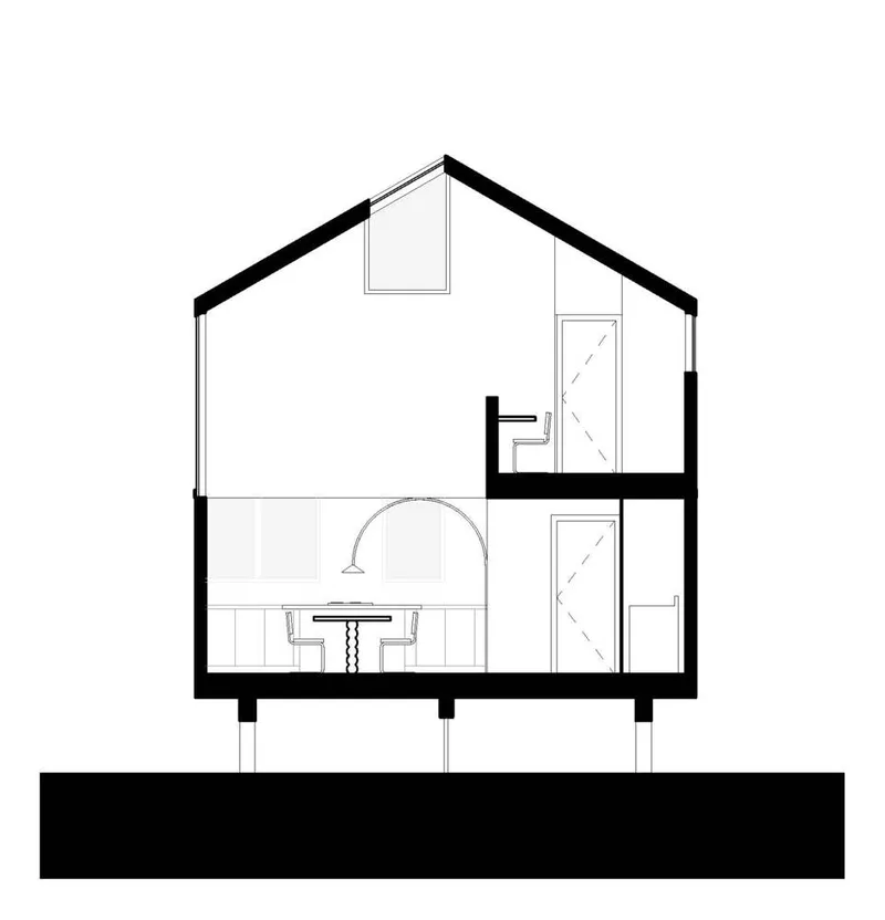 Section drawing through two-story gabled volume showing stair connecting levels