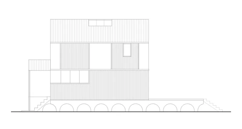 Elevation drawing showing the vertically clad facade with offset volumes above an arched podium