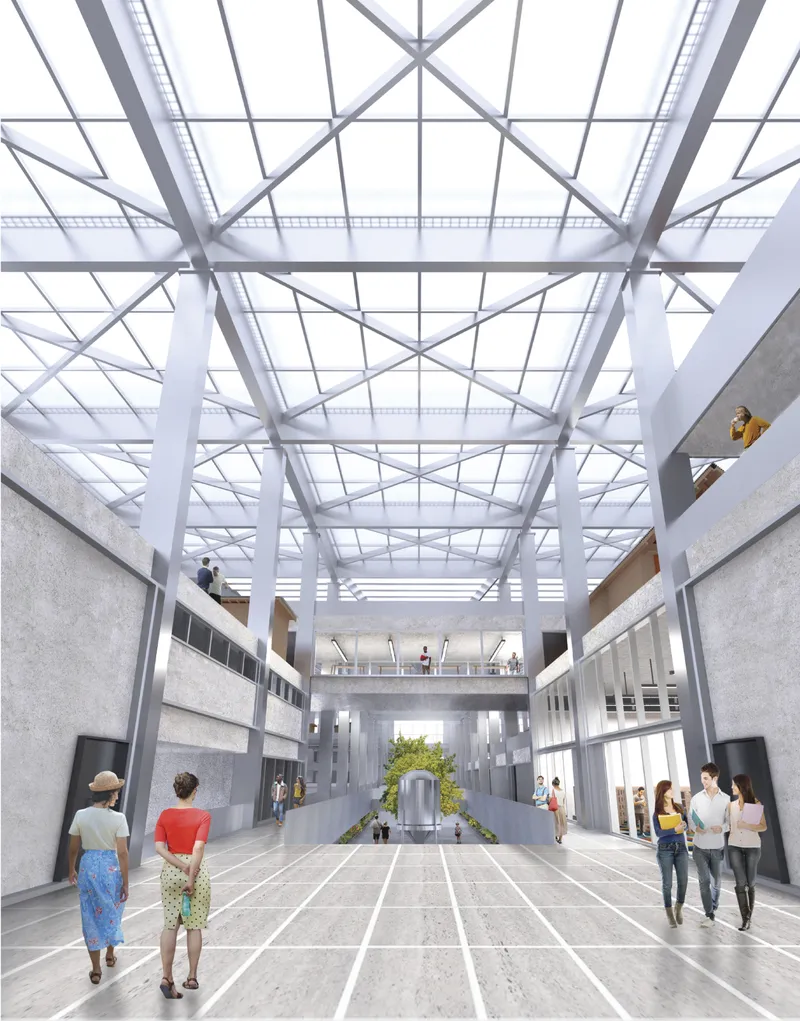 Interior atrium with white steel truss roof and visitors walking through the glazed central corridor