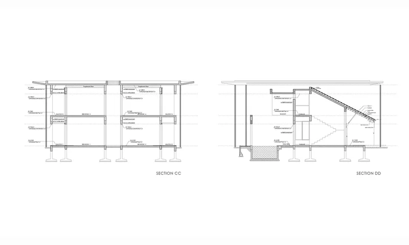 Section drawings revealing the staircase volume and structural column grid across two levels