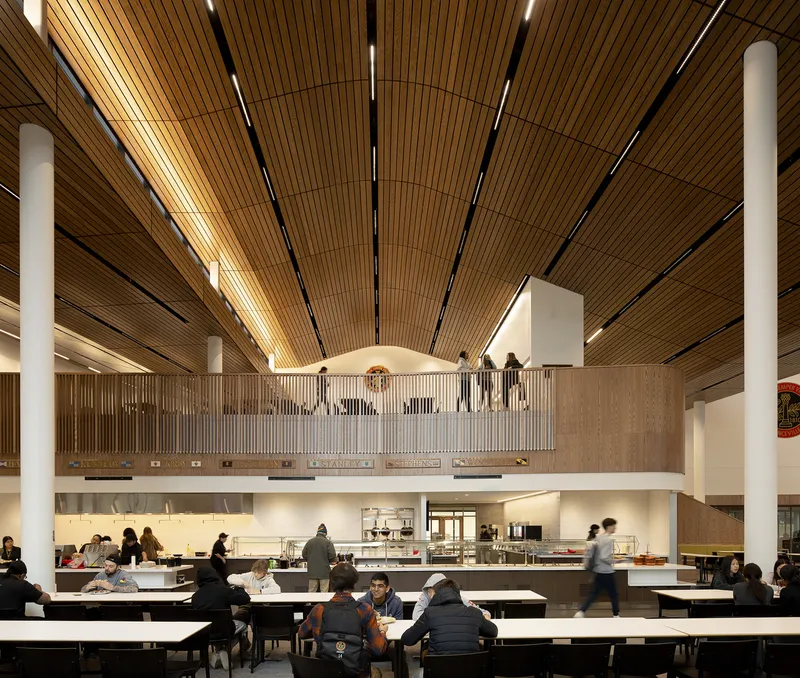 Mezzanine balcony with vertical timber screening overlooking the dining area below