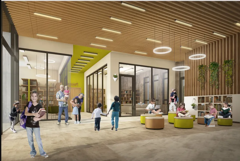 Library lobby with timber slat ceiling, circular pendant lights and green and yellow upholstered seating