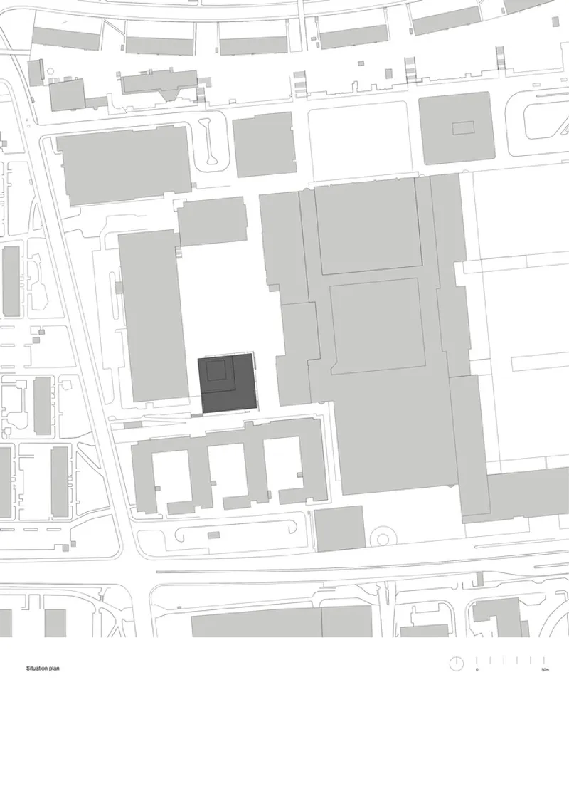 Site plan drawing showing the building footprint among surrounding blocks and streets