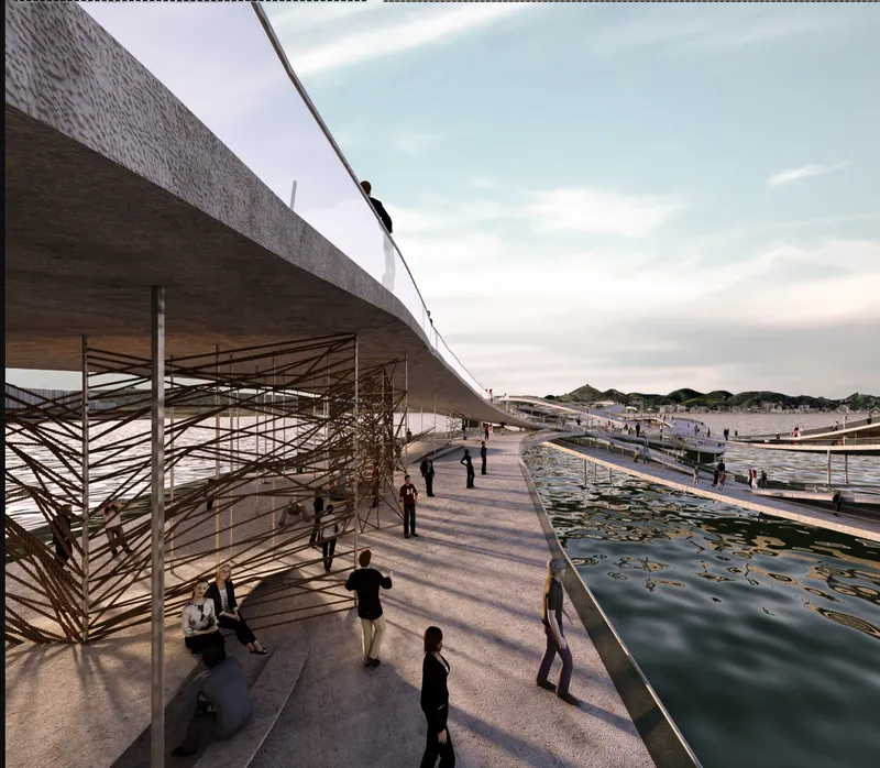 Promenade deck at dusk with long shadows cast by visitors walking alongside water gardens and timber screening below