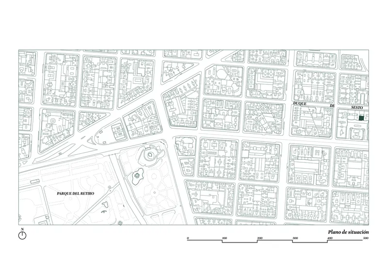 Site plan drawing showing urban block layout with streets, buildings, and a park to the west