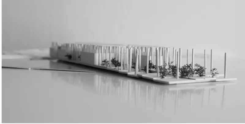 Physical model of an elongated pavilion with slender vertical supports and miniature trees along its length