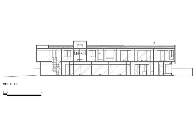 Section drawing showing a two-story structure with a central spiral staircase and extensive glazing throughout