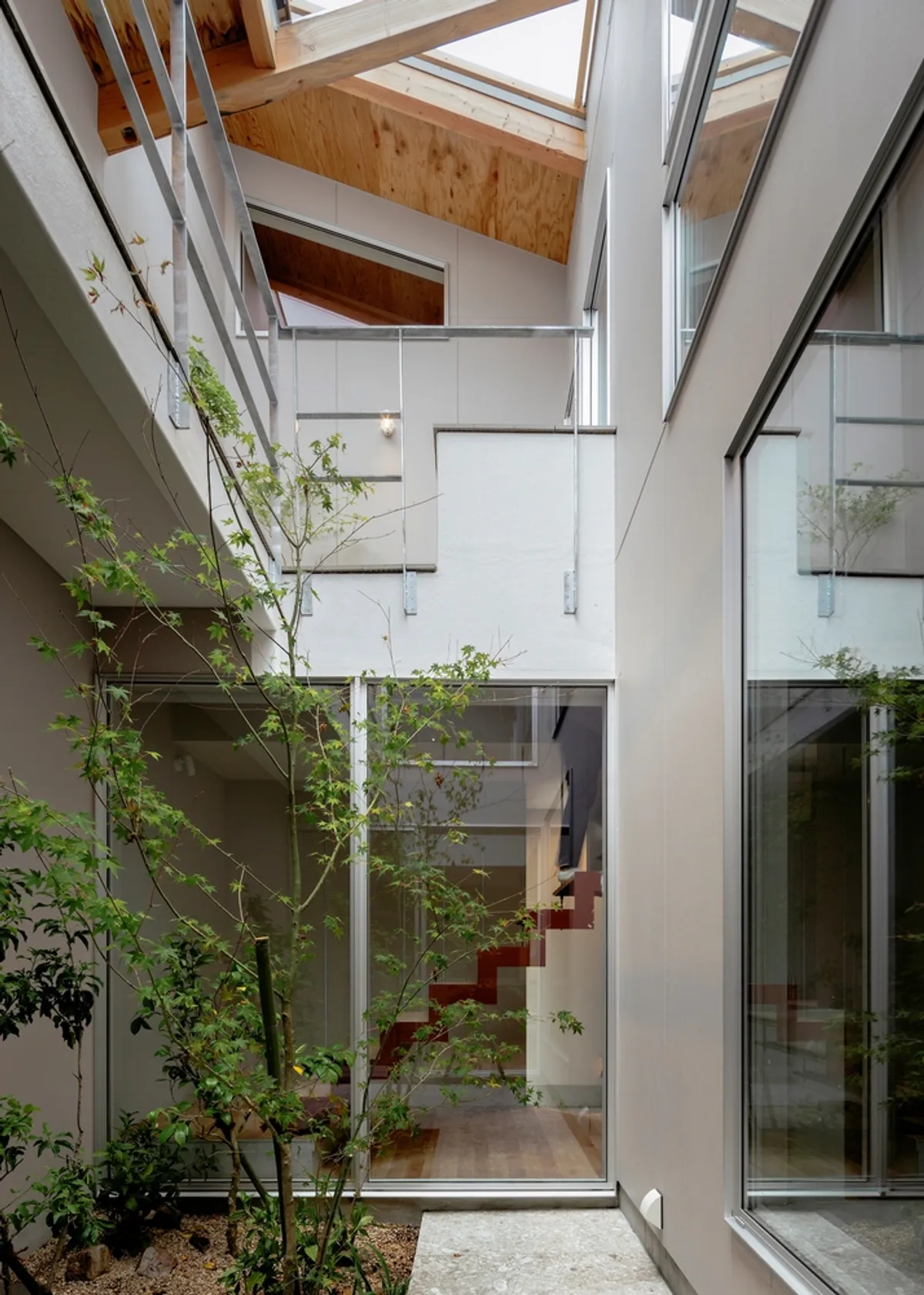 KOMINORU Design Carves a Courtyard Heart into a Narrow Japanese Townhouse