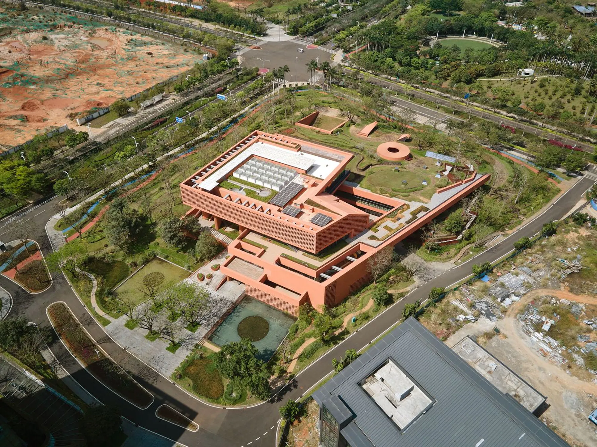 THAD SUP Atelier Wraps a Rural Software Campus in Layered Terracotta Screens