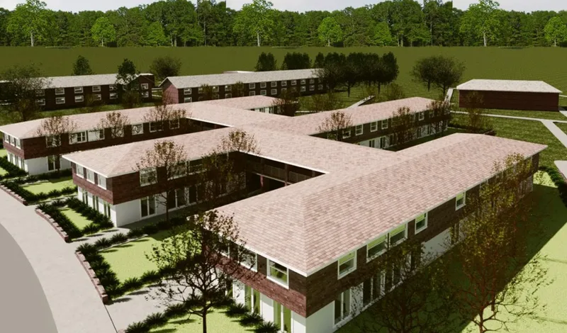 Aerial rendering of interconnected residential wings with pitched tile roofs enclosing landscaped courtyards