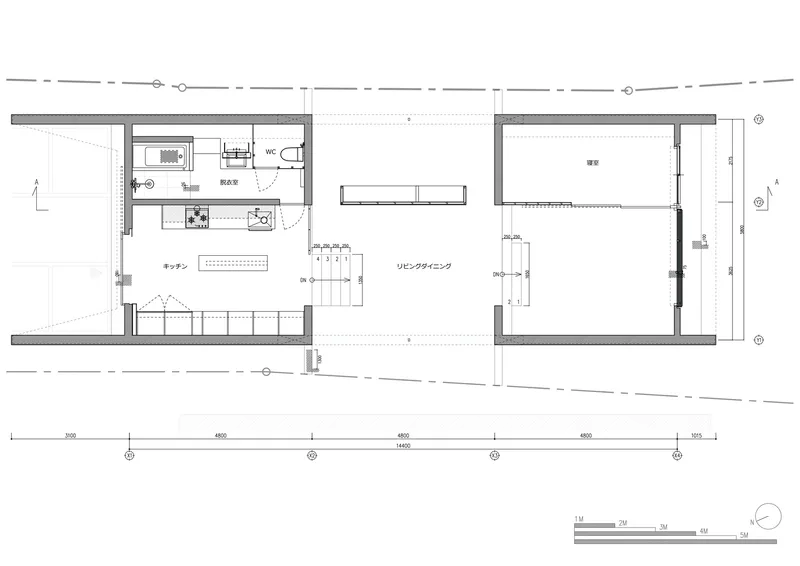 Floor plan drawing depicting kitchen and living spaces with furniture layout and structural grid