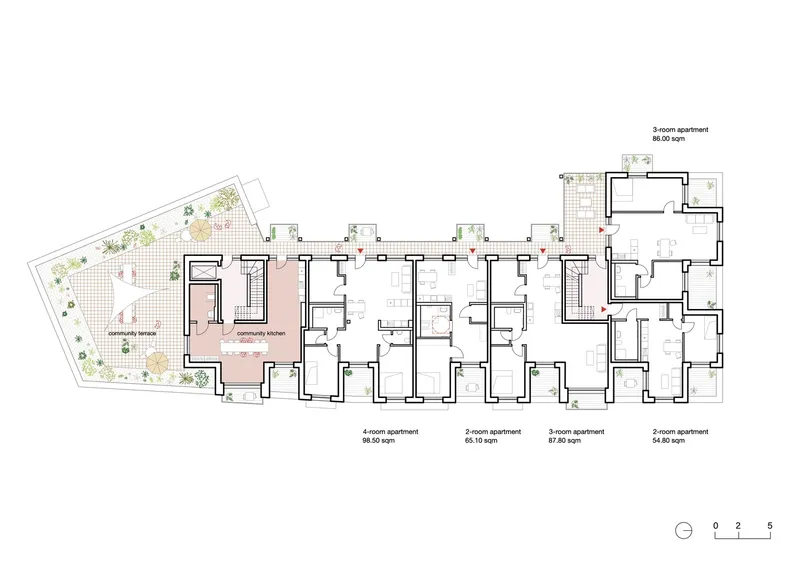Floor plan featuring residential units with a community kitchen and planted terrace at one end