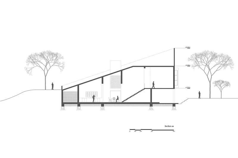 Section drawing revealing sloped roof, internal staircase, columns, and figures beneath deciduous trees