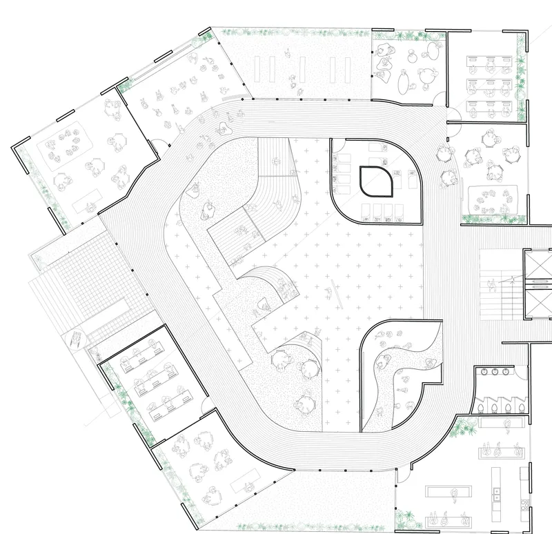 Floor plan drawing showing a central tiered amphitheater surrounded by classrooms and support spaces