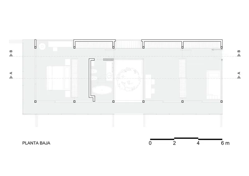 Floor plan drawing revealing a linear arrangement of rooms with courtyards and a central tree