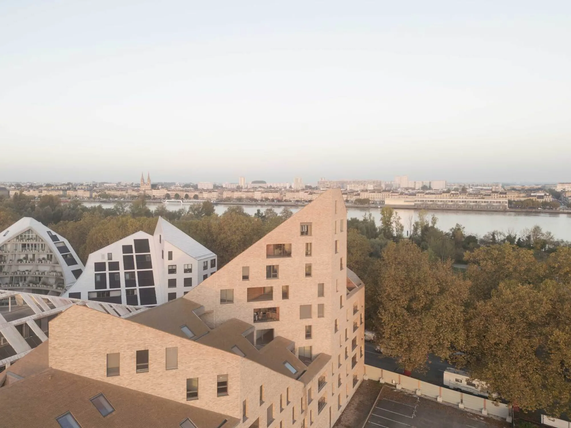 urbanmakers and Selva & Maugin Wrap 54 Social Housing Units in a Seamless Brick-and-Tile Skin in Bordeaux