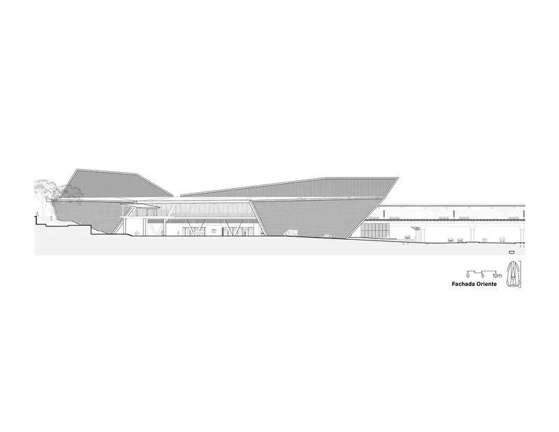 Elevation drawing depicting the angular roof forms rising and falling along the length of the building