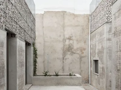 Corpo Atelier Dissolves Concrete Walls into Air Across Three Courtyard Façades in Faro
