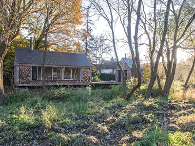 Jan Tyrpekl Builds a Firewood-Clad Atelier That Disappears into a Czech Meadow
