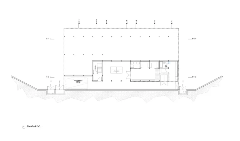 First floor plan drawing showing a large open terrace with a compact service core at center