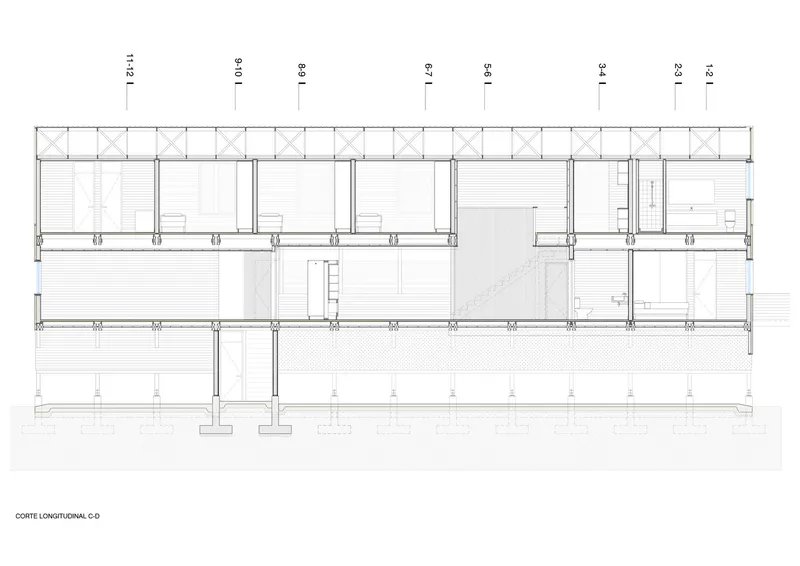 Longitudinal section drawing cutting through multiple floors, revealing vertical circulation and structural column grid