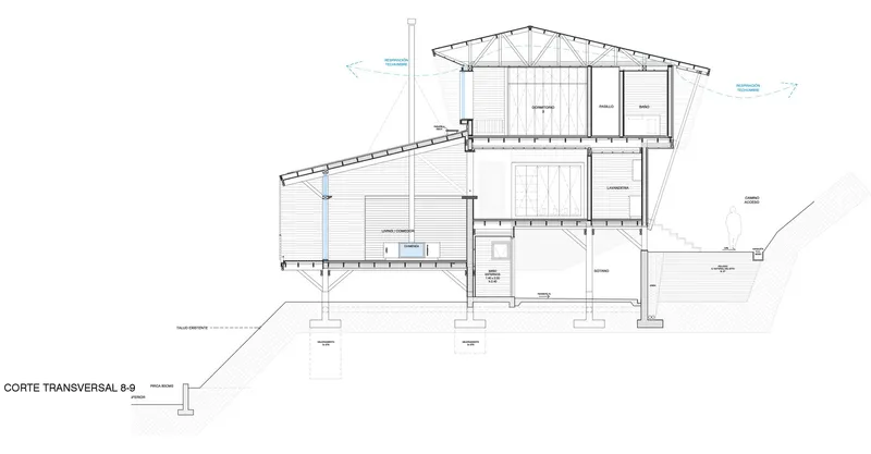 Transverse section drawing showing the relationship between upper and lower level rooms with sloped terrain and pier foundations