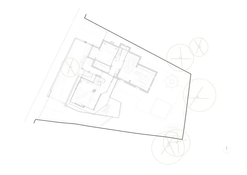 Floor plan drawing depicting residential layout with angular courtyard and surrounding landscape