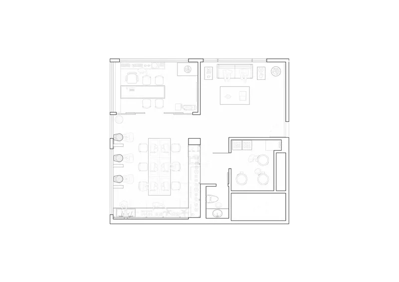 Floor plan drawing showing open kitchen and dining area with adjacent bedroom suite