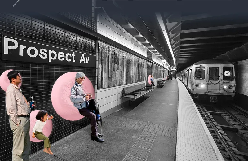 Subway platform with pink circular wall graphics and commuters waiting as a train arrives