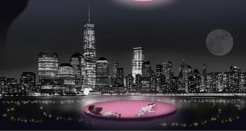 Pink circular platform with reclining figures at waterfront with illuminated skyline and full moon at night