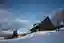 ADR Builds a Black Timber Cottage on a Czech Ski Slope with Three Sleeping Lofts Inside Its Gable