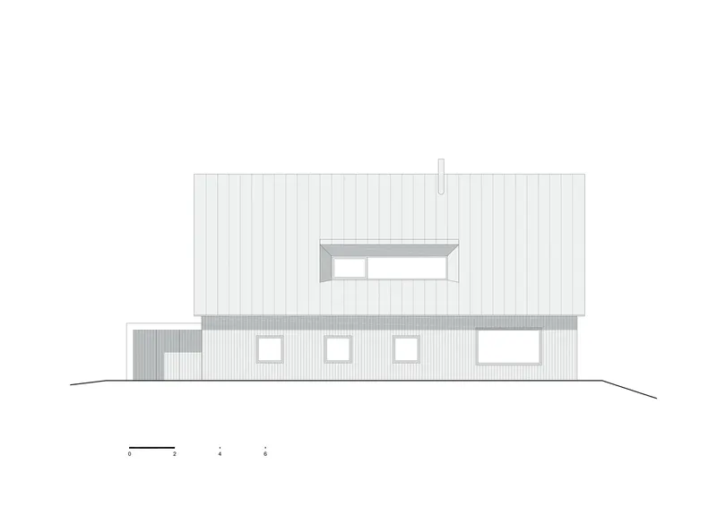 Elevation drawing showing the vertical facade with four windows and a dormer beneath the gabled roof