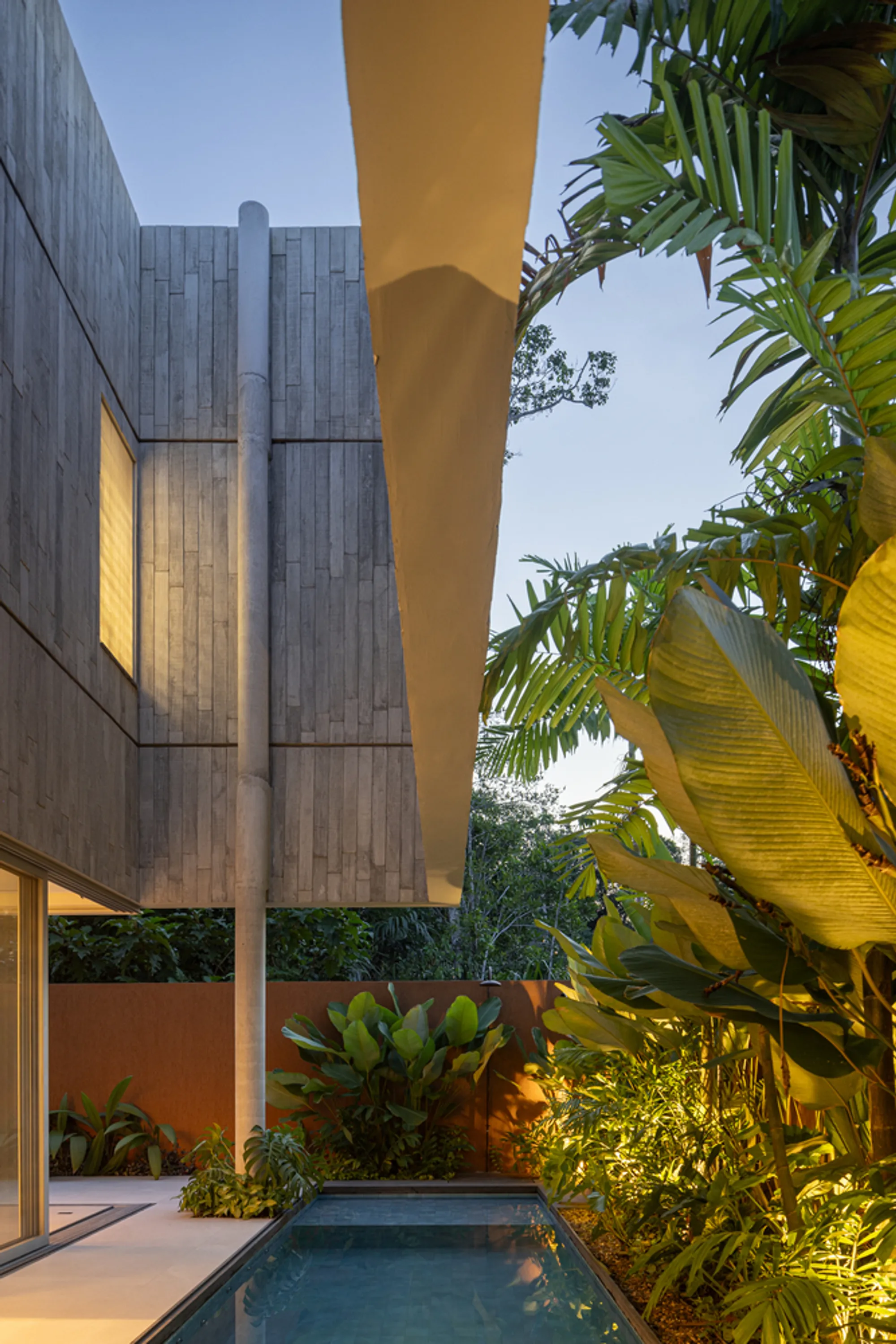 Laurent Troost Designs a Brazilian Home Around Darkness for a Client with Photophobia