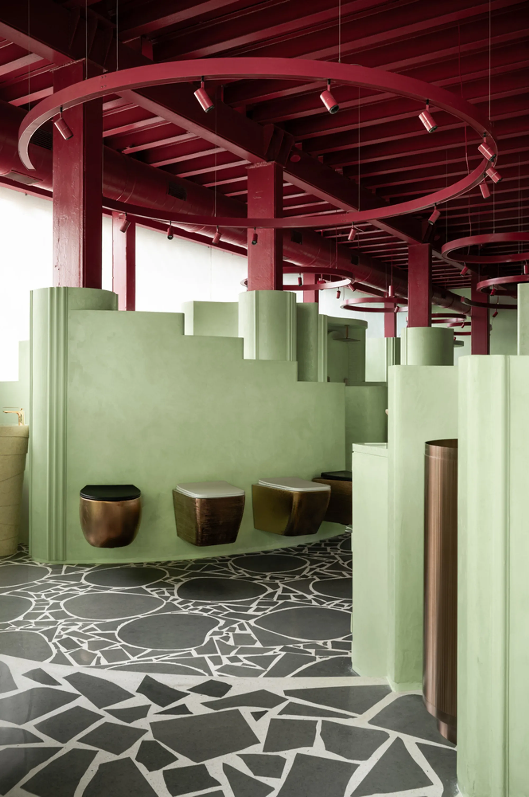 MuseLAB Wraps a Mumbai Bathware Showroom in Mint Green Circles and Berry-Red Steel