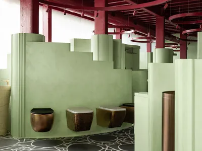 MuseLAB Wraps a Mumbai Bathware Showroom in Mint Green Circles and Berry-Red Steel