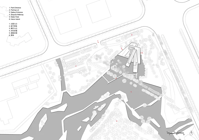 Site plan drawing showing angular building footprints beside a large irregular water body and parking area