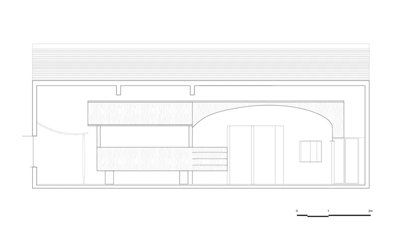 Section drawing showing interior spaces with a curved ceiling vault and staircase