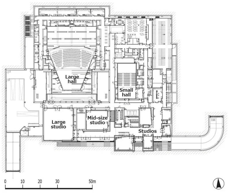 Floor plan drawing showing multiple performance halls, studios and support spaces arranged around a central circulation core