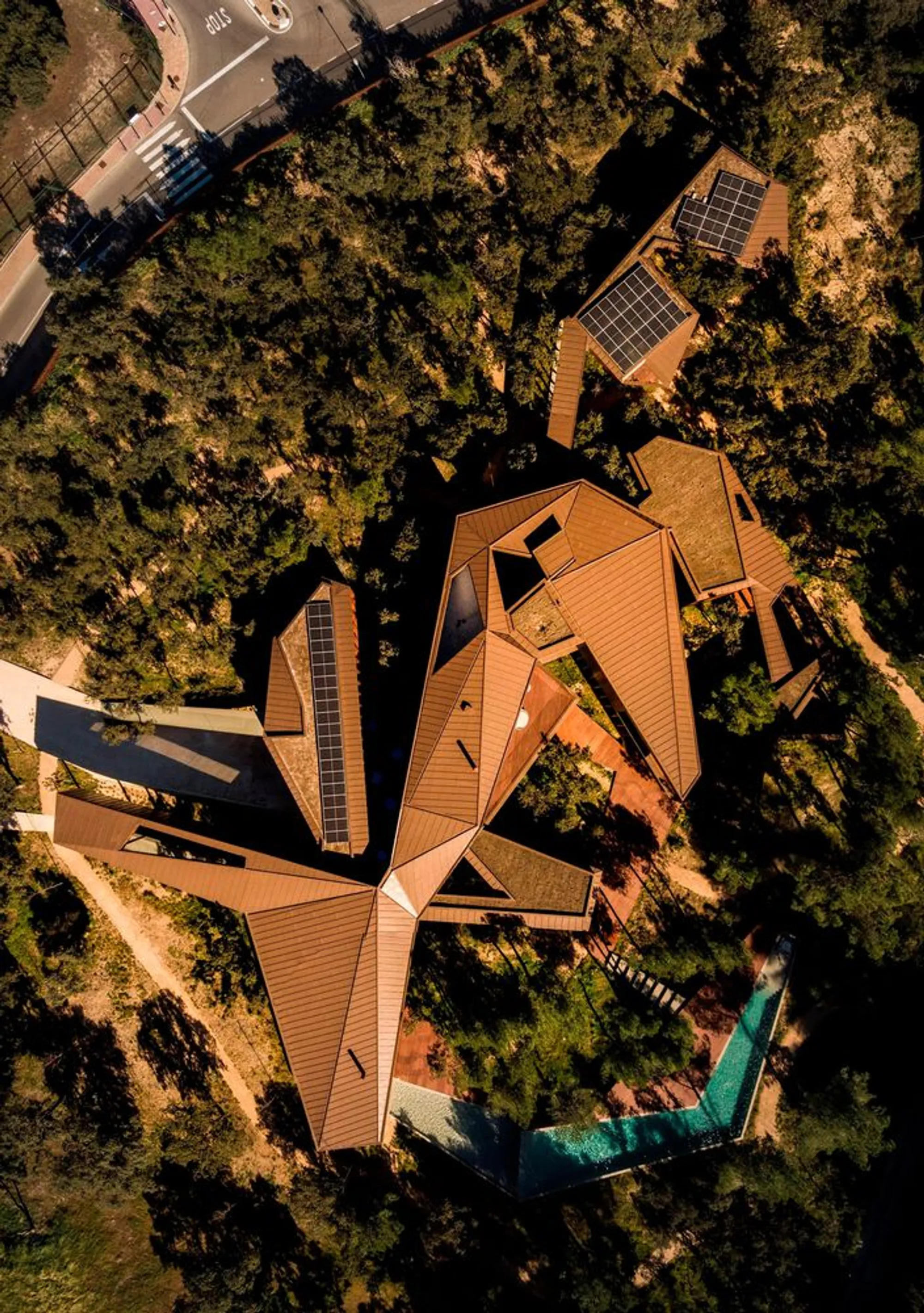Vasco Vieira Arquitectos Scatters a Pinwheel Villa Through a Madrid Forest