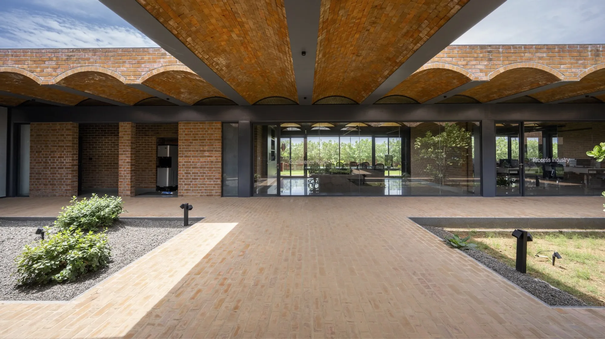 KSM Architecture Wraps an Indian Factory Office in Undulating Brick Vaults and Planted Courtyards