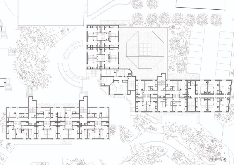 Site plan drawing showing multiple residential blocks arranged around a central courtyard with surrounding trees