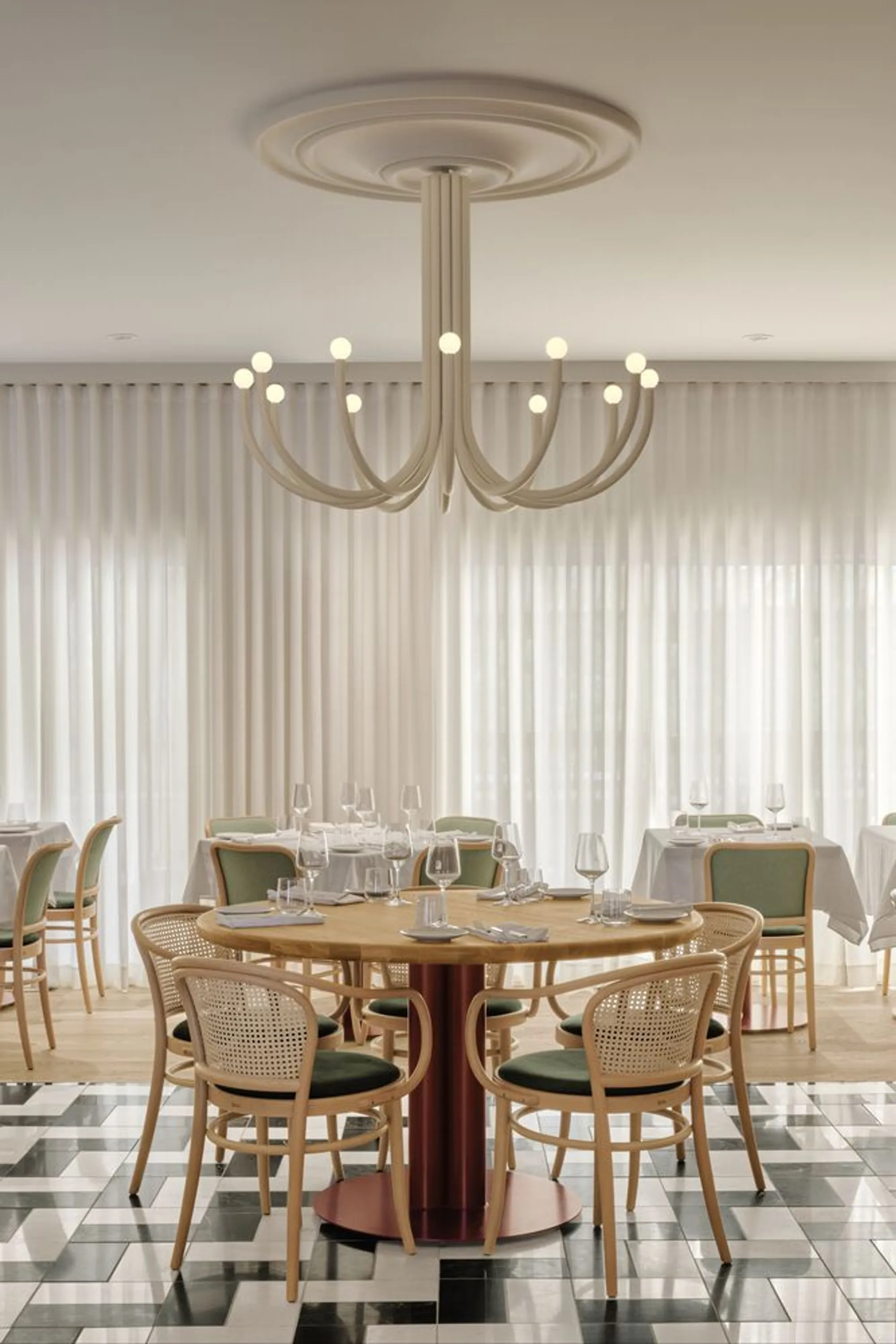 Ivy Studio Lines a Montreal Italian Restaurant with Stone, Marble, and Fluted Glass