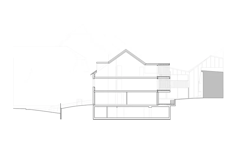 Section drawing revealing stacked interior spaces with cantilevered decks and pitched roof above
