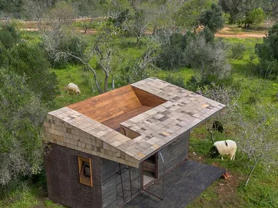 Madeiguincho Converts a Shipping Container into a Cork-Clad Tiny House in Portugal's Algarve
