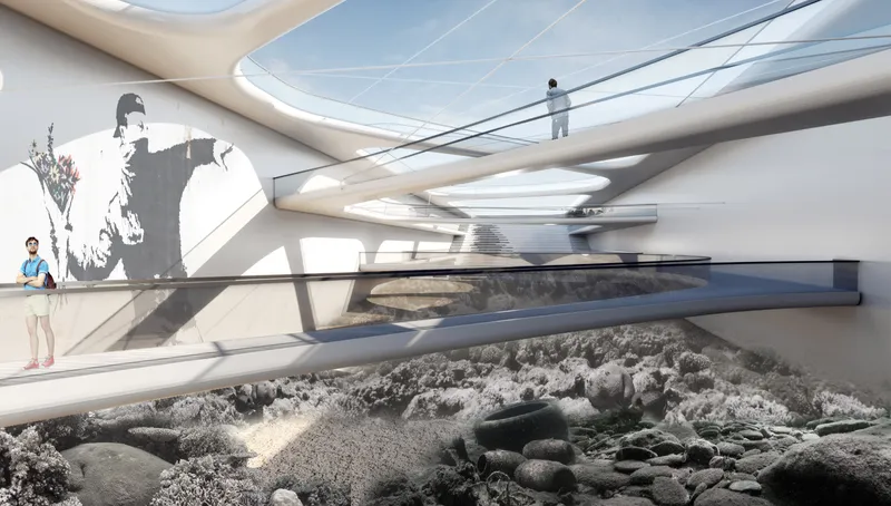 Interior space with crossed white beams overhead and rocky landscape installation on the floor below